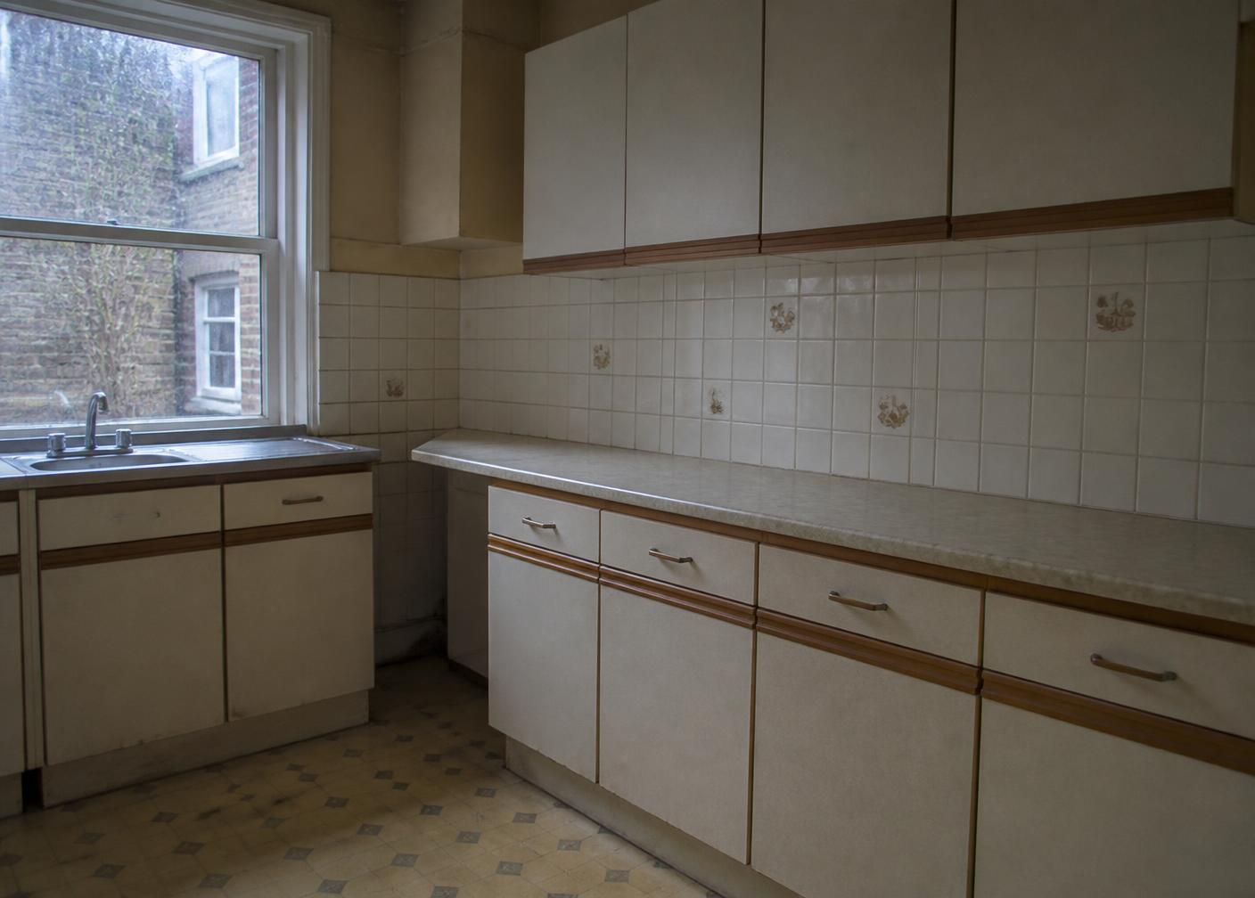 Dated kitchen in an Ealing home before refurbishment by Chiswick Carpenter