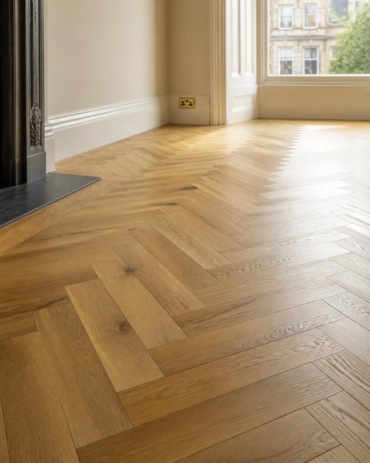 Herringbone parquet flooring installation in a period Chiswick reception room